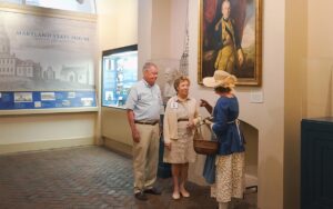 Watermark's tour guide points out Lafayette's portrait that hangs in the Maryland State House to commemorate his connection to the state.
